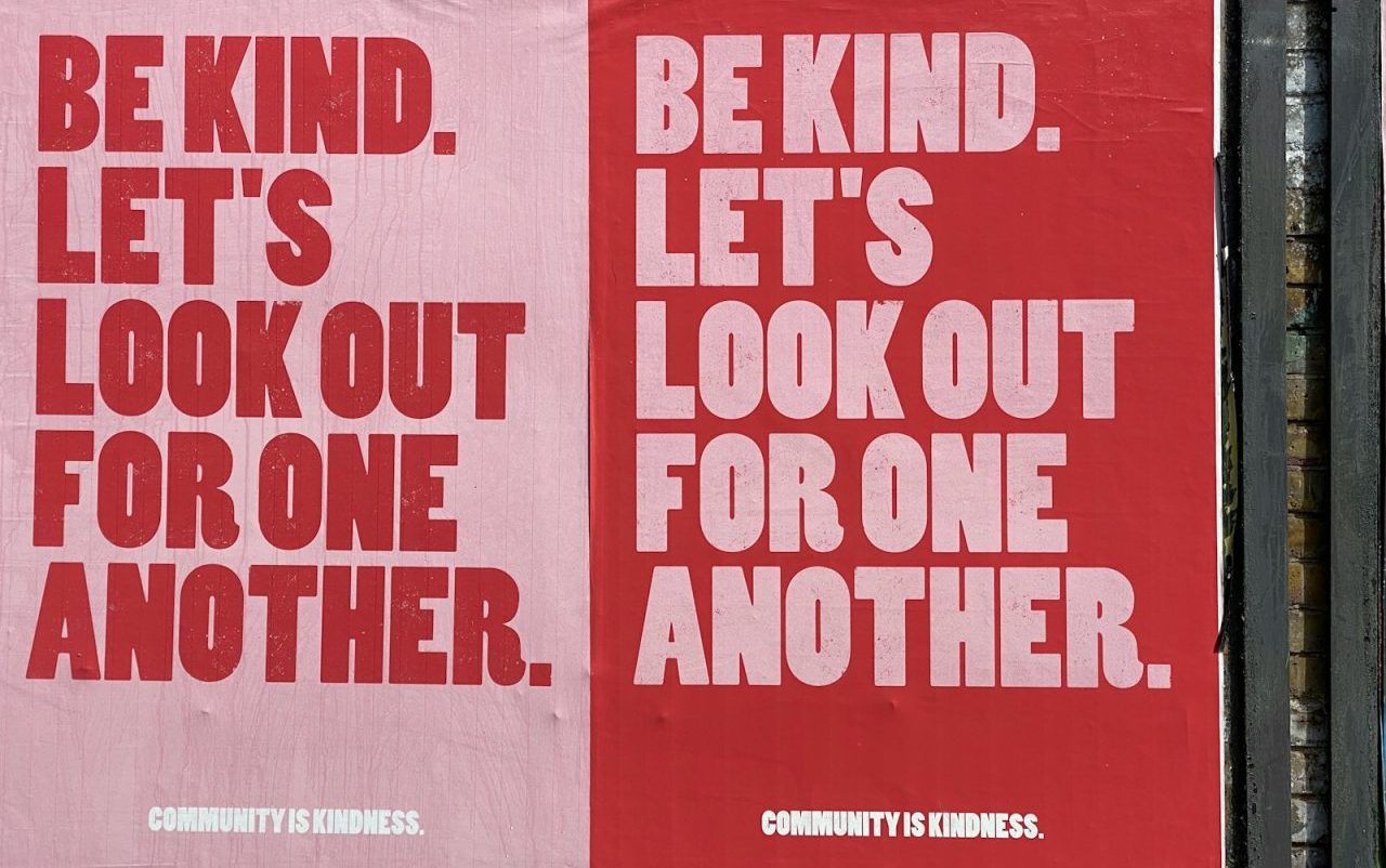 poster saying “be kind. let’s look out for one another."